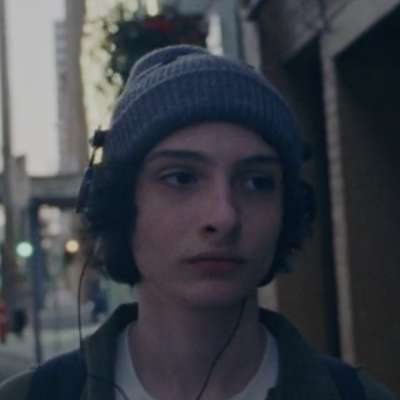 Finn Wolfhard heads around town in Calpurnia’s dreamy new video for ‘Greyhound’