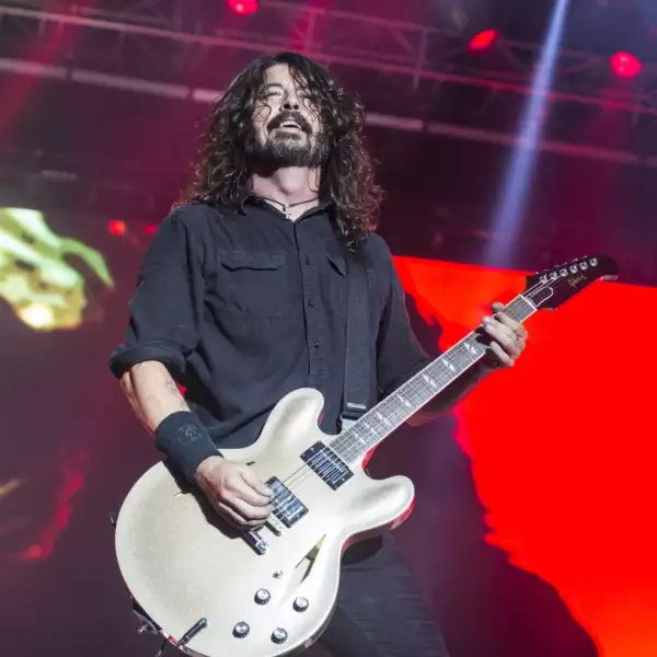 Watch Foo Fighters and Rivers Cuomo cover Kiss