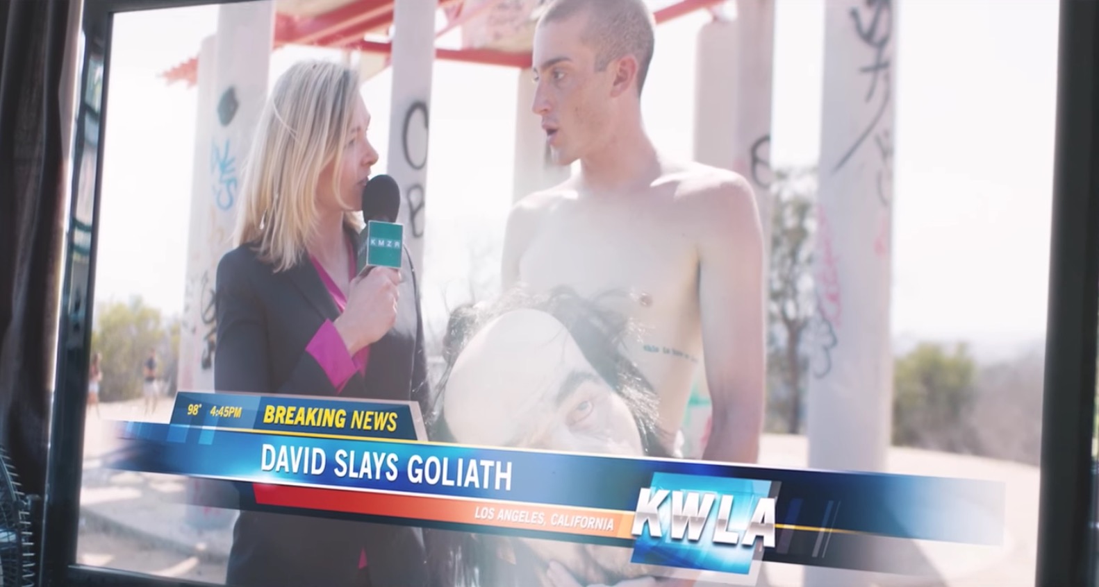 Watch David become Goliath in Holy Fuck’s video for ‘Neon Dad’