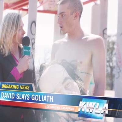 Watch David become Goliath in Holy Fuck’s video for ‘Neon Dad’