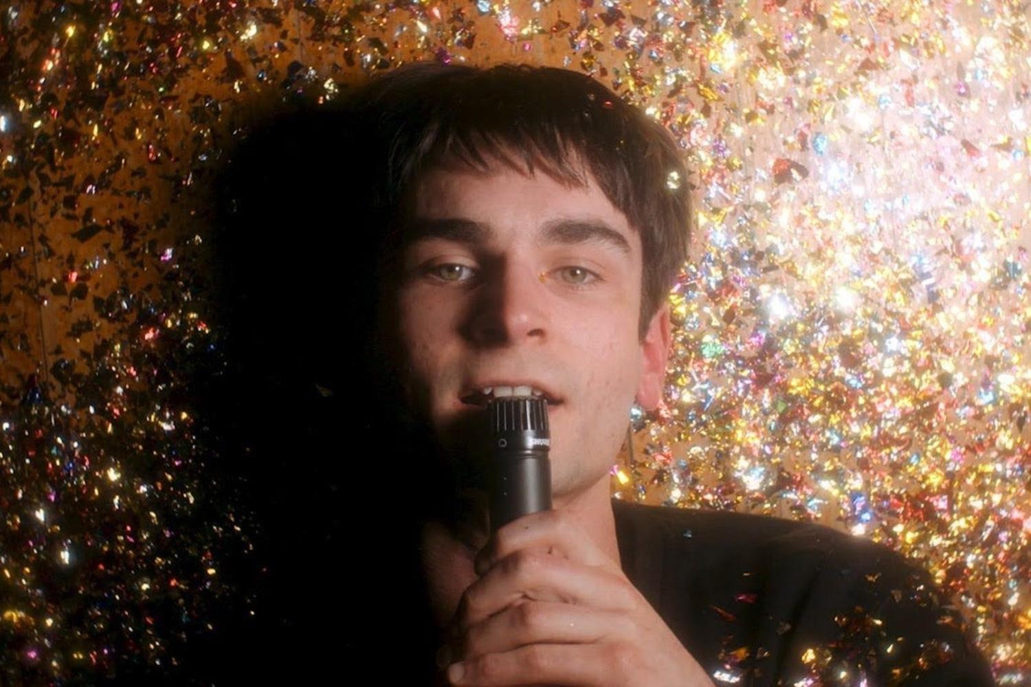 Kane Strang gets glittery in the video for ‘My Smile Is Extinct’