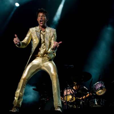 The Killers bring gold suits and theatrical showmanship to Day Two of Benicassim
