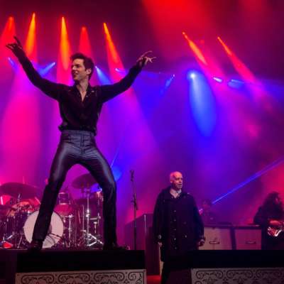 All Killers, no filler: Brandon and co bring relentless hits, guest stars and Jimmy Carr with a broom to Glastonbury