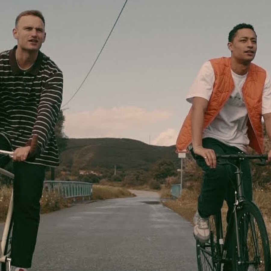 Loyle Carner and Tom Misch get on their bikes in new 'Angel' video