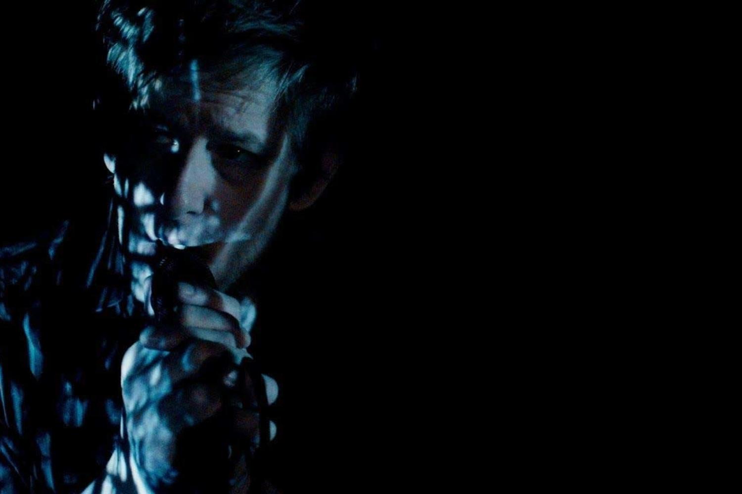 Spoon hide in the shadows in their ‘I Ain’t The One’ video